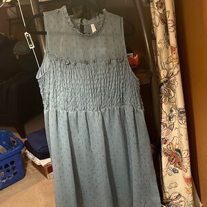 light Chiffon dress w/ light sparkles acacia skirt. Higher neck line